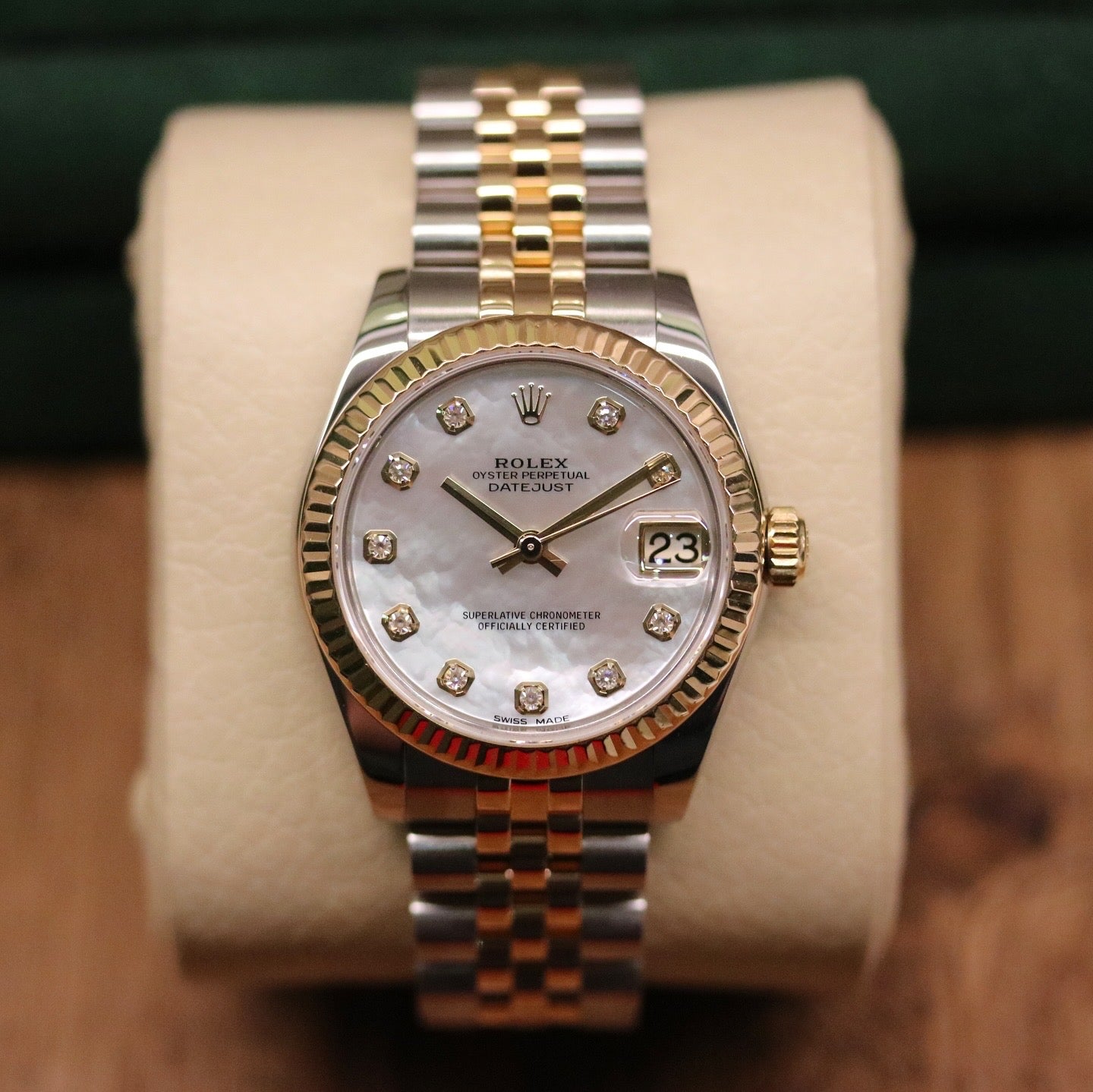 Rolex Datejust 31 ref. 178273 from 2017 in two-tone stainless steel and yellow gold with a factory white mother-of-pearl diamond dial, 31mm case, Jubilee bracelet, sapphire crystal, and automatic movement. Very good condition, complete with original 2017 Bergströms Uppsala certificate, box, booklets, and tag. Detailed product images showing the MOP dial texture, diamond markers, fluted bezel, case, bracelet, and clasp, offered by Klocksalongen with a 12-month functional warranty.