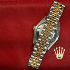 Rolex Datejust 31 ref. 178273 from 2012 in two-tone stainless steel and yellow gold with a factory silver diamond dial, 31mm case, Jubilee bracelet, sapphire crystal, and automatic movement. Presented in very good condition with original 2012 Netherlands certificate, box, tags, certificate holder, and booklets. Detailed product photos show the diamond markers, fluted bezel, case, bracelet, and clasp, offered by Klocksalongen with a 12-month functional warranty.