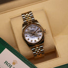 Rolex Datejust 31 ref. 178273 from 2017 in two-tone stainless steel and yellow gold with a factory white mother-of-pearl diamond dial, 31mm case, Jubilee bracelet, sapphire crystal, and automatic movement. Very good condition, complete with original 2017 Bergströms Uppsala certificate, box, booklets, and tag. Detailed product images showing the MOP dial texture, diamond markers, fluted bezel, case, bracelet, and clasp, offered by Klocksalongen with a 12-month functional warranty.