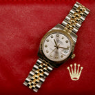 Rolex Datejust 31 ref. 178273 from 2018 in two-tone stainless steel and yellow gold with a factory silver diamond dial, 31mm case, Jubilee bracelet, sapphire crystal, and automatic movement. Presented in very good condition with original Egypt 2018 certificate, box, booklets, and tags. Includes photos detailing the diamond dial, fluted bezel, bracelet, case, and clasp, offered by Klocksalongen with a 12-month functional warranty.