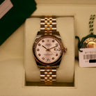 Rolex Datejust 31 ref. 178273 from 2018 in two-tone stainless steel and yellow gold with a factory silver diamond dial, 31mm case, Jubilee bracelet, sapphire crystal, and automatic movement. Presented in very good condition with original Egypt 2018 certificate, box, booklets, and tags. Includes photos detailing the diamond dial, fluted bezel, bracelet, case, and clasp, offered by Klocksalongen with a 12-month functional warranty.