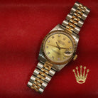 Rolex Datejust 31 ref. 68273 from 1988 in two-tone stainless steel and yellow gold with a factory champagne diamond dial, 31mm case, Jubilee bracelet, sapphire crystal, and automatic movement. Provided in very good condition with a Rolex pouch. Detailed product photos showing the champagne diamond dial, fluted bezel, case, bracelet, clasp, and finishing, offered by Klocksalongen with a 12-month functional warranty.