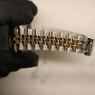 Rolex Datejust 31 ref. 68273 from 1988 in two-tone stainless steel and yellow gold with a factory champagne diamond dial, 31mm case, Jubilee bracelet, sapphire crystal, and automatic movement. Provided in very good condition with a Rolex pouch. Detailed product photos showing the champagne diamond dial, fluted bezel, case, bracelet, clasp, and finishing, offered by Klocksalongen with a 12-month functional warranty.