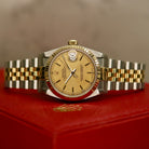 Rolex Datejust 31 ref. 68273 from 1990 in two-tone stainless steel and yellow gold with a factory silver diamond dial, 31mm case, Jubilee bracelet, sapphire crystal, and automatic movement. Unpolished example in extremely good condition with original Spain certificate, box, booklets, and tag. Detailed product photos showing the dial, diamond markers, bezel, case, bracelet, and clasp, available from Klocksalongen with a 12-month functional warranty.