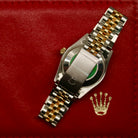 Rolex Datejust 31 ref. 68273 from 1990 in two-tone stainless steel and yellow gold with a factory silver diamond dial, 31mm case, Jubilee bracelet, sapphire crystal, and automatic movement. Unpolished example in extremely good condition with original Spain certificate, box, booklets, and tag. Detailed product photos showing the dial, diamond markers, bezel, case, bracelet, and clasp, available from Klocksalongen with a 12-month functional warranty.