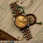 Rolex Datejust 31 ref. 68273 from 1990 in two-tone stainless steel and yellow gold with a factory silver diamond dial, 31mm case, Jubilee bracelet, sapphire crystal, and automatic movement. Unpolished example in extremely good condition with original Spain certificate, box, booklets, and tag. Detailed product photos showing the dial, diamond markers, bezel, case, bracelet, and clasp, available from Klocksalongen with a 12-month functional warranty.