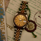 Rolex Datejust 31 ref. 68273 from 1990 in two-tone stainless steel and yellow gold with a factory silver diamond dial, 31mm case, Jubilee bracelet, sapphire crystal, and automatic movement. Unpolished example in extremely good condition with original Spain certificate, box, booklets, and tag. Detailed product photos showing the dial, diamond markers, bezel, case, bracelet, and clasp, available from Klocksalongen with a 12-month functional warranty.