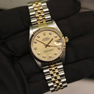 Rolex Datejust 31 ref. 68273 from 1999 in two-tone stainless steel and yellow gold with a factory champagne diamond dial, 31mm case, Jubilee bracelet, sapphire crystal, and automatic movement. Recently serviced and polished, delivered in very good condition with original Japan 1999 certificate, box, booklets, and tag. Detailed product images show the diamond-set dial, fluted bezel, case, bracelet, clasp, and finishing, offered by Klocksalongen with a 12-month service warranty.