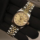 Rolex Datejust 31 ref. 68273 from 1999 in two-tone stainless steel and yellow gold with a factory champagne diamond dial, 31mm case, Jubilee bracelet, sapphire crystal, and automatic movement. Recently serviced and polished, delivered in very good condition with original Japan 1999 certificate, box, booklets, and tag. Detailed product images show the diamond-set dial, fluted bezel, case, bracelet, clasp, and finishing, offered by Klocksalongen with a 12-month service warranty.