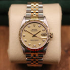 Rolex Datejust 31 ref. 68273 from 1999 in two-tone stainless steel and yellow gold with a factory champagne diamond dial, 31mm case, Jubilee bracelet, sapphire crystal, and automatic movement. Recently serviced and polished, delivered in very good condition with original Japan 1999 certificate, box, booklets, and tag. Detailed product images show the diamond-set dial, fluted bezel, case, bracelet, clasp, and finishing, offered by Klocksalongen with a 12-month service warranty.