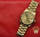 Rolex Datejust 31 ref. 68278 from 1987 in solid yellow gold with a factory champagne diamond dial, 31mm case, President bracelet, sapphire crystal, and automatic movement. Presented in very good condition and complete with original 1987 Italian certificate, box, booklets, and tags. Detailed product photos showing the diamond dial, gold case, bracelet, clasp, and overall finish, available from Klocksalongen with a 12-month functional warranty.