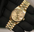 Rolex Datejust 31 ref. 68278 from 1987 in solid yellow gold with a factory champagne diamond dial, 31mm case, President bracelet, sapphire crystal, and automatic movement. Presented in very good condition and complete with original 1987 Italian certificate, box, booklets, and tags. Detailed product photos showing the diamond dial, gold case, bracelet, clasp, and overall finish, available from Klocksalongen with a 12-month functional warranty.