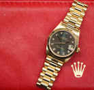 Rolex Datejust 31 ref. 68278 from 1989 in solid yellow gold with a rare factory chocolate/dark grey diamond dial (2020 version), 31mm case, President bracelet, sapphire crystal, and automatic movement. Presented in superb condition and complete with original Italy 1989 certificate, box, booklets, and tag. Detailed photos showing the upgraded dial, diamond markers, gold bezel, case, bracelet, and clasp, offered by Klocksalongen with a 12-month functional warranty.