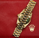 Rolex Datejust 31 ref. 68278 from 1989 in solid yellow gold with a rare factory chocolate/dark grey diamond dial (2020 version), 31mm case, President bracelet, sapphire crystal, and automatic movement. Presented in superb condition and complete with original Italy 1989 certificate, box, booklets, and tag. Detailed photos showing the upgraded dial, diamond markers, gold bezel, case, bracelet, and clasp, offered by Klocksalongen with a 12-month functional warranty.