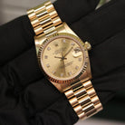 Rolex Datejust 31 ref. 68278 from 1991 in solid yellow gold with a factory champagne diamond dial, 31mm case, President bracelet, sapphire crystal, and automatic movement. Presented in very good condition with Klocksalongen authenticity certificate and packaging. Detailed product photos show the champagne diamond dial, gold case, bracelet, clasp, and finishing, offered by Klocksalongen with a 12-month functional warranty.