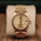 Rolex Datejust 31 ref. 68278 from 1991 in solid yellow gold with a factory champagne diamond dial, 31mm case, President bracelet, sapphire crystal, and automatic movement. Presented in very good condition with Klocksalongen authenticity certificate and packaging. Detailed product photos show the champagne diamond dial, gold case, bracelet, clasp, and finishing, offered by Klocksalongen with a 12-month functional warranty.