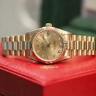 Rolex Datejust 31 ref. 68278 from 1992 in solid yellow gold with a factory champagne diamond dial, 31mm case, President bracelet, sapphire crystal, and automatic movement. Top-condition example, complete with original Spain 1992 certificate, box, booklets, and tag. Detailed product images showing the champagne diamond dial, gold bezel, case, bracelet links, and clasp, offered by Klocksalongen with a 12-month functional warranty.