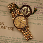 Rolex Datejust 31 ref. 68278 from 1992 in solid yellow gold with a factory champagne diamond dial, 31mm case, President bracelet, sapphire crystal, and automatic movement. Top-condition example, complete with original Spain 1992 certificate, box, booklets, and tag. Detailed product images showing the champagne diamond dial, gold bezel, case, bracelet links, and clasp, offered by Klocksalongen with a 12-month functional warranty.