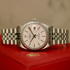Rolex Datejust 36 ref. 16030 from 1984 in stainless steel with a silver dial, 36mm case, steel bracelet, plexiglass crystal, and automatic movement; detailed product photos showing the watch’s case, dial, bracelet, and condition, available from Klocksalongen with authenticity certificate and warranty.