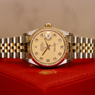 Rolex Datejust 36 ref. 16233 from 2003 in steel and yellow gold with a factory champagne diamond dial, 36mm case, Jubilee bracelet, sapphire crystal, and automatic movement. Close-up product images showing the diamond hour markers, two-tone case and bracelet, fluted yellow-gold bezel, clasp, and overall condition. Includes original South Korea certificate (2003), box, and tag, offered by Klocksalongen with a 12-month functional warranty.